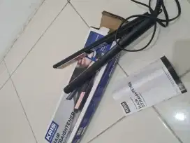 Catokan kris pelurus rambut