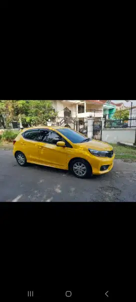 Brio E matik 2023 kuning tgn 1 dari baru