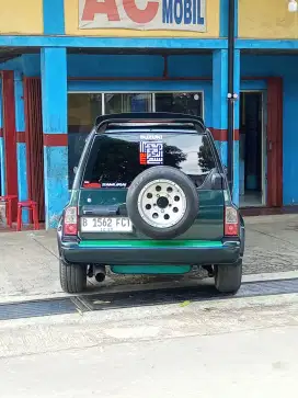 Suzuki Sidekick 97 manual bensin 1600cc warna hijau metalik