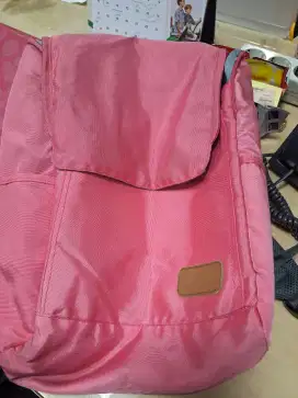 Tas ransel laptop pink merek suissewin