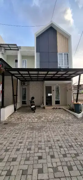 Di kontrakan perumahan dreamland block C nomor 4