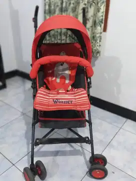 stroller pliko merah.
