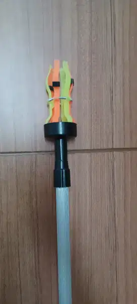 Tongkat untuk mengganti lampu.