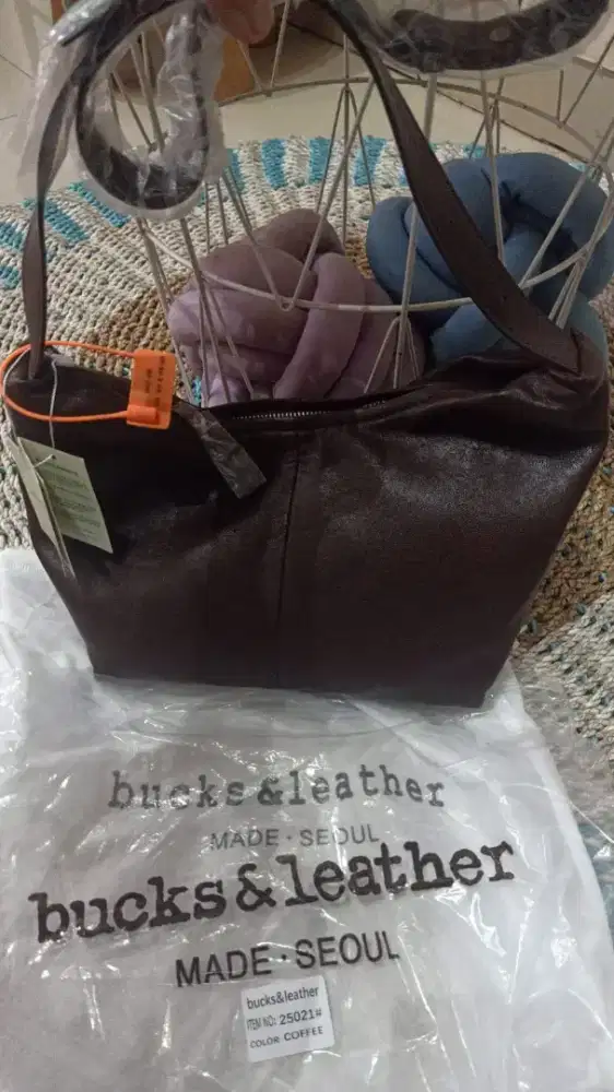 Tas Buck & Leather
