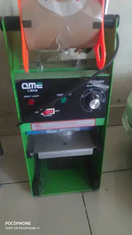 Mesin press cup minuman