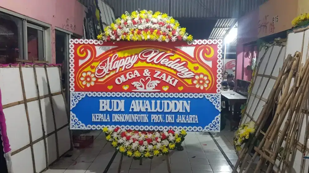 Karangan bunga papan turut berdukacita