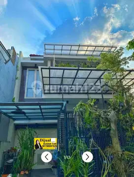 Dijual Rumah Asri Pakuwon Indah Dekat Citraland Lontar Surabaya Barat