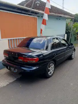 Timor dohc tahun 1999