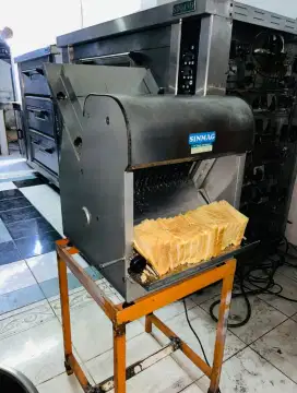 Mesin bread slicer potong roti tawar ukuran 2 cm merk Sinmag Taiwan