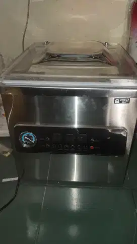 Mesin vacuum seller double seal