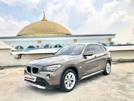 BMW X1 Executive Tahun 2011 Automatic Coklat Metalik