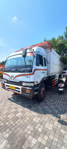 Dump truk nissan cwa 260 mx, indek 24 kubik, th 2014