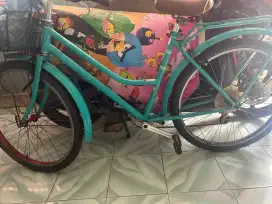 Sepeda schwinn cream