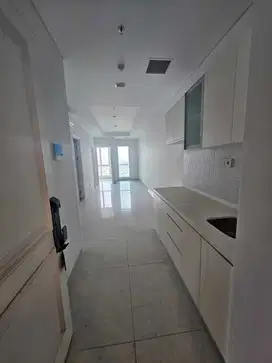 2BR Unfurnished Kondominium Grand Madison - Mall Central Park