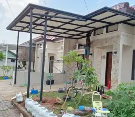 Pemasangan kanopi carport atap alderon