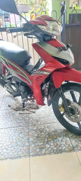 Revo DX merah 2010/11