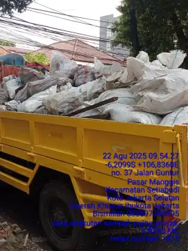 Jasa pembersihan puing bangunan