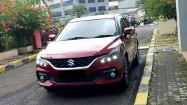 Km15rb suzuki baleno hatchback 2024 merah