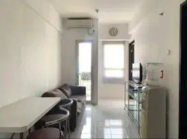 DISEWAKAN 2 BEDROOM SEMI FURNISH APARTEMEN PURIMAS LANTAI 10