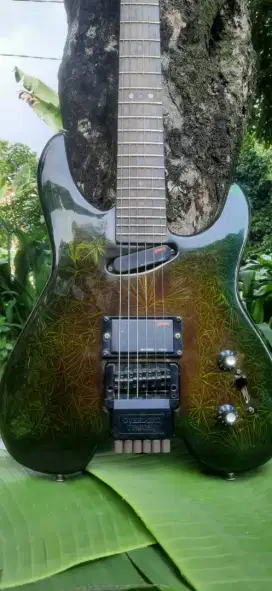 Gitar listrik headless carbon aktif istimewa