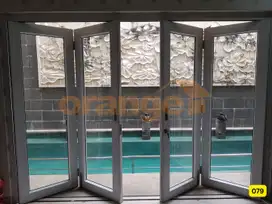 Di Jual Rumah Kota Wisata ada Kolam Renang Depan taman Hadap Selatan