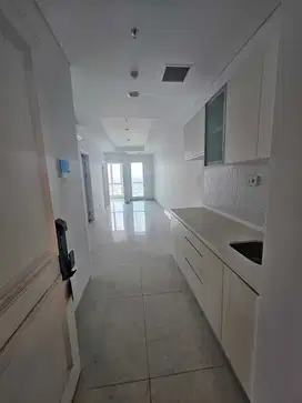 2BR Unfurnished Kondominium Grand Madison - Mall Central Park