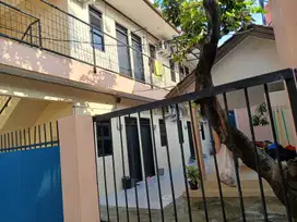 Rumah induk plus kostan 17 kamar di karang Mulya