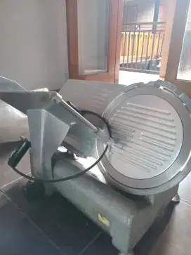Mesin slicer getra