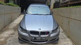 BMW 330i 2011 Bensin