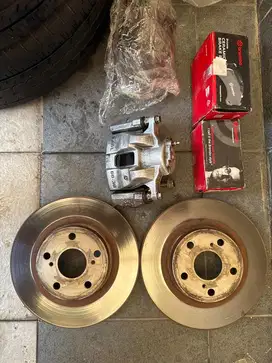 Ban luar + velg + Disc break assy