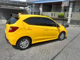 Brio E matik 2023 kuning tgn 1 dari baru