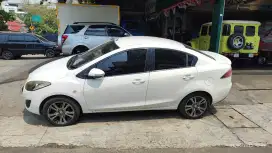 Mazda 2 sedan, 2012