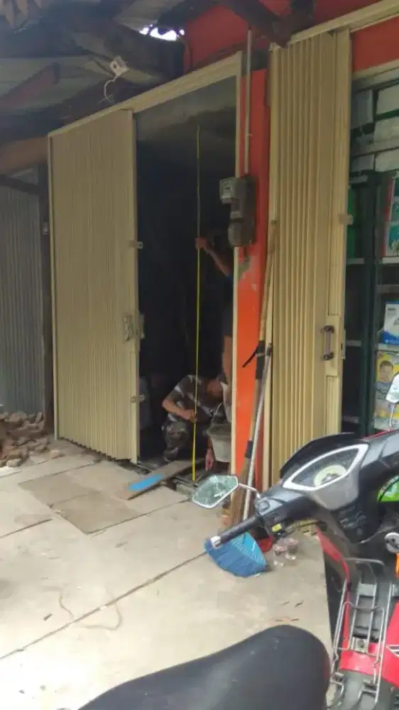 Tukang service rolling door murah