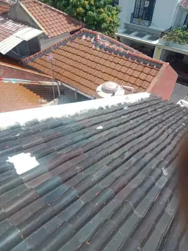 Perbaikan atap bocor dan renovasi
