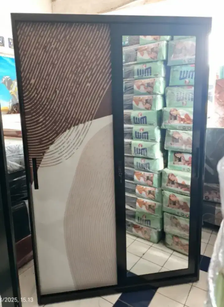 Lemari besi pintu geser 120x50x185 motif Madiun kota