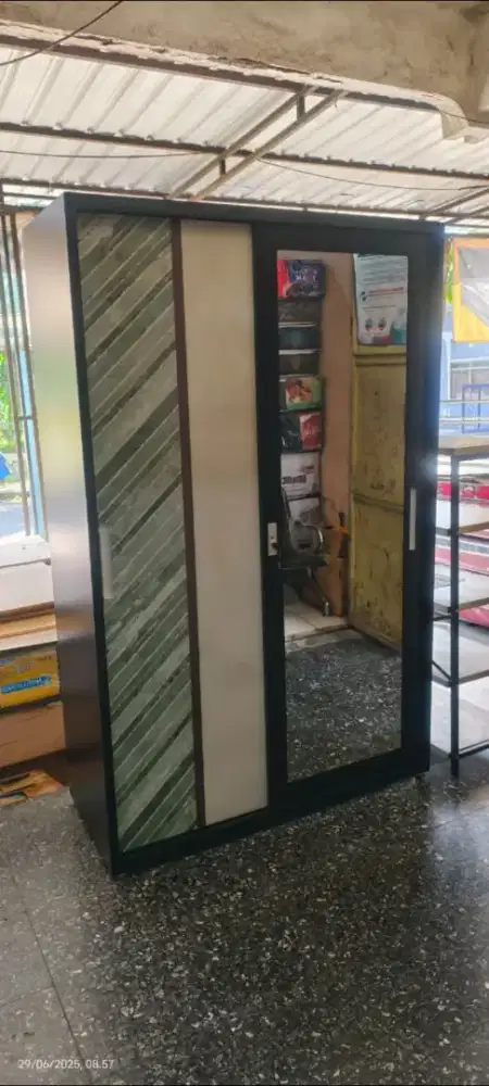 Lemari besi pintu geser 120x50x185 motif Madiun kota