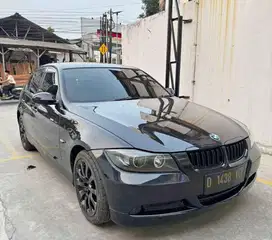 BMW 320i 2009 Bensin