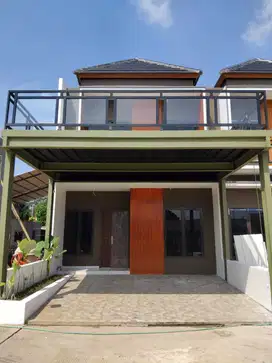 RUMAH CLUSTER PREMIUM DI PINGGIR JALAN RAYA