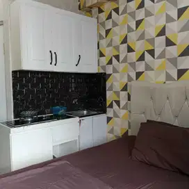 The green apartment pramuka city studio mall