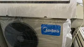 Jual ac midea 1/2pk R410