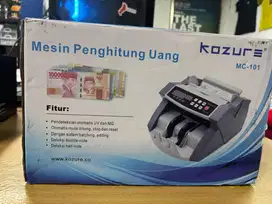 Mesin Penghitung Uang (Kozur)