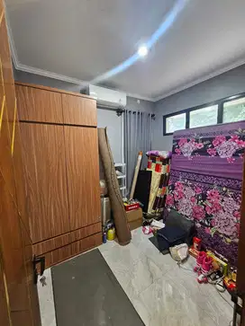 Rumah  Cantik Dan Nyaman Di Cluster Lavesh Harapan Indah. Bekasi