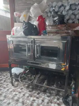 Open 2 pintu geratis loyang pakai gas, tidak pernah di pakai
