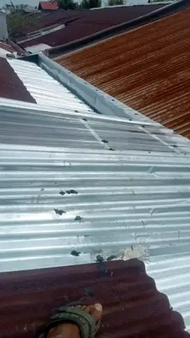 Tukang perbaikan atap bocor dinding rembes talang air renovasi rumah