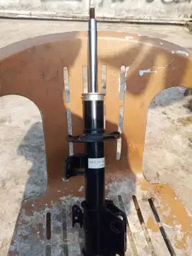 Shockbreaker Calya Sigra depan kiri