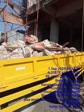 Jasa buang puing tanah