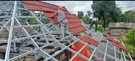 Atap genteng metal pasir