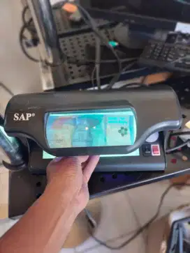 Lampu/alat pendeteksi uang palsu merk SAP, Bekas normal siap pakai