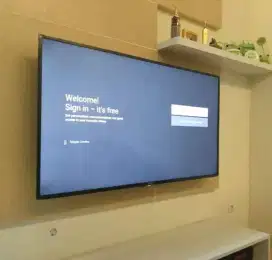 hasil pasang tv led gantung di tembok pake bracket standar kuat nyaman