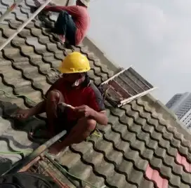 Tukang perbaikan atap rumah